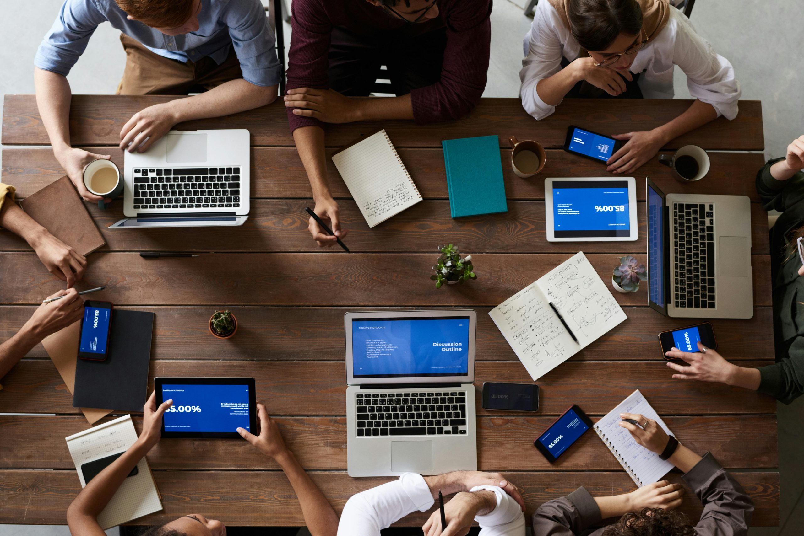 team on laptops